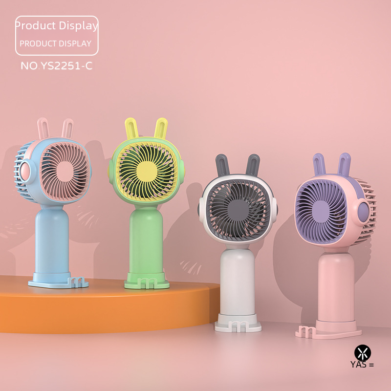 Wholesale portable handheld USB mini cartoon charging fan for students, with factory LOGO printing
